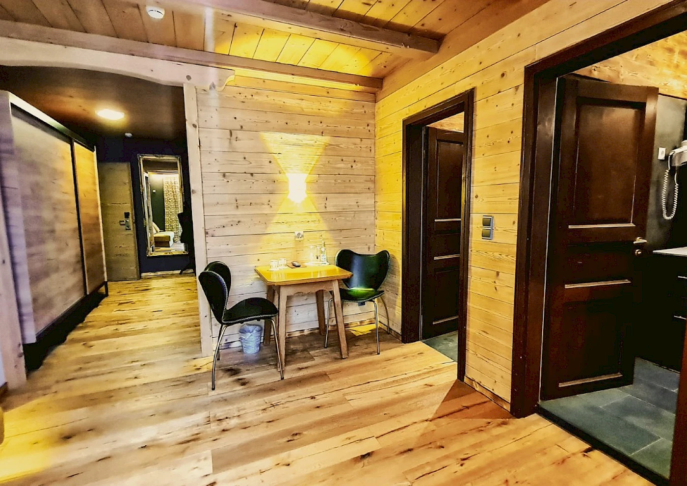 Double bed in a cosy room at a lakeside hotel